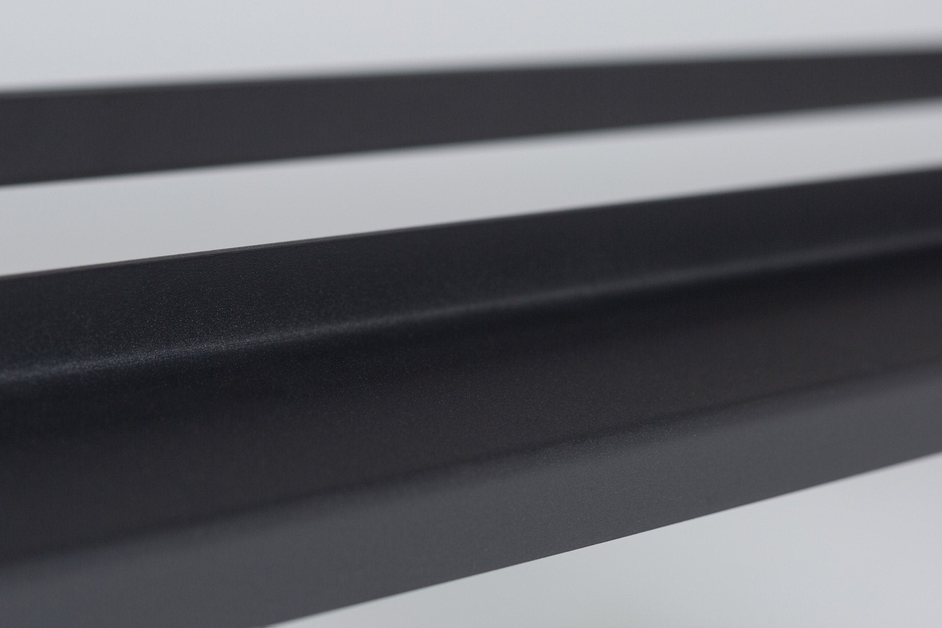 Close-up view of a REP Dumbbell Rack shelf.